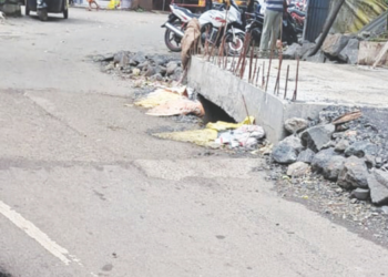 तवसाळकर लॉजसमोरील मोरीचे काम करा
